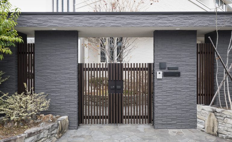 japanese house entrance with fence
